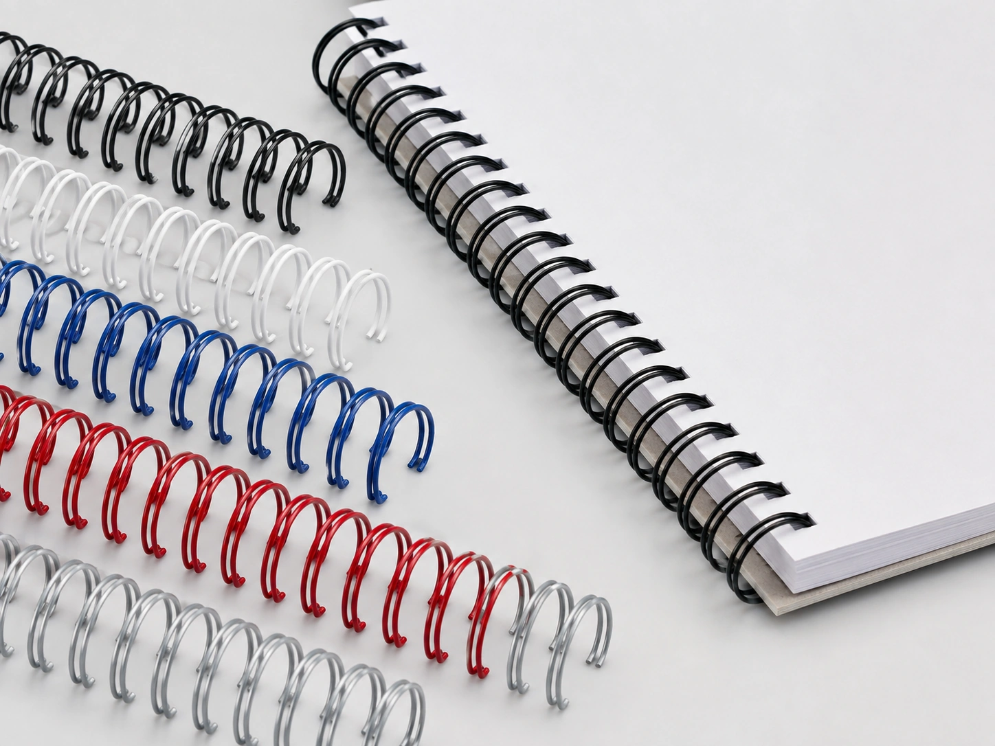Custom colored nylon coated wire o binding supplies demonstrating smooth surface finish and bend integrity after closing